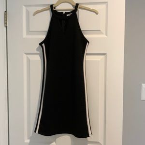Black dress with white stripes along side